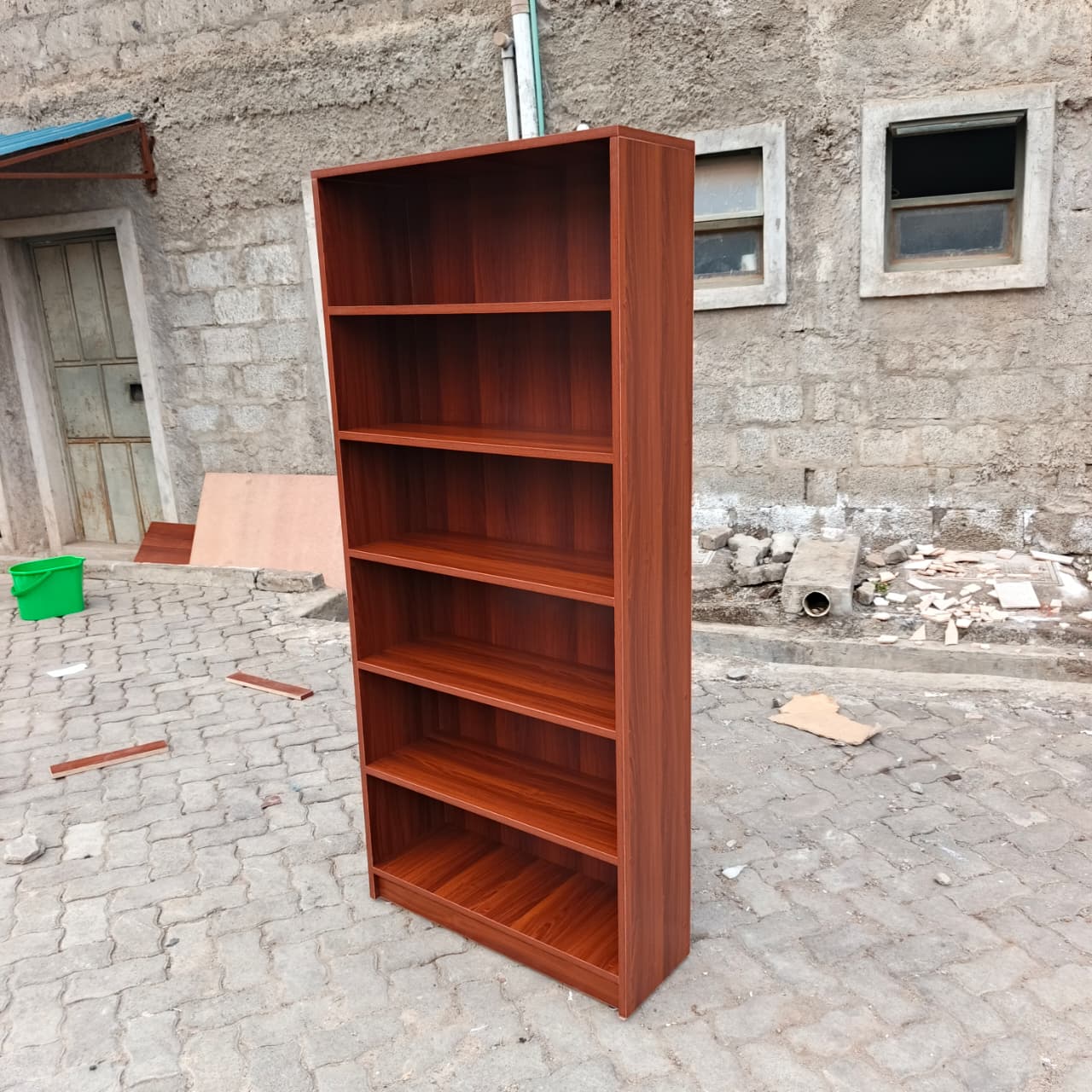 red brown bookshelf, six tier bookshelf, 6 tier bookcase, modern bookshelf, modern bookcase, wooden bookshelf, wooden bookcase, red brown bookcase, dark wood bookshelf, six shelf bookcase, tall bookshelf, tall bookcase, storage bookshelf, storage bookcase, display bookshelf, display bookcase, open shelf bookcase, open bookshelf, contemporary bookshelf, contemporary bookcase, minimalist bookshelf, minimalist bookcase, home bookshelf, office bookshelf, study bookshelf, library bookshelf, book storage shelf, home storage shelves, office storage shelves, decorative bookshelf, stylish bookcase, modern storage unit, multipurpose bookshelf, durable bookshelf, heavy duty bookcase, high quality bookshelf, premium bookcase, affordable bookshelf, compact bookshelf, space saving bookcase, vertical storage shelf, ladder style bookshelf, rectangular bookshelf, shelving unit modern, book organizer shelf, office book storage, study room bookshelf, bedroom bookshelf, living room bookshelf, bookshelf furniture Kenya, bookcase Nairobi, bookshelf Nairobi, wooden shelves Kenya, office bookshelf Kenya, home bookshelf Nairobi, study shelf Kenya, bookcase suppliers Nairobi, bookshelf for sale Kenya, bookcase deals Nairobi, cheap bookshelf Kenya, affordable bookcase Nairobi, premium bookshelf Kenya, modern bookshelf Kenya, bookcase showroom Nairobi, buy bookshelf Kenya, bookshelf online Nairobi, storage shelves Kenya, workspace shelves Nairobi, home furniture bookshelf Kenya, office furniture bookshelf Nairobi, library shelves Kenya, bookcase delivery Nairobi, shelving unit Kenya, modern shelving Nairobi, book rack Kenya, wooden book rack Nairobi, tall shelf Kenya, storage rack Nairobi, bookcase near me Kenya, Nairobi furniture shop bookshelf, Kenya furniture store bookcase, bookshelf best Kenya, bookcase high quality Nairobi, modern shelving unit Kenya, decorative shelf Nairobi, stylish bookshelf Kenya, elegant bookcase Nairobi, durable shelving Kenya, strong bookshelf Nairobi, vertical storage Nairobi Kenya, compact shelving Kenya, modern home decor shelf Nairobi, office decor bookshelf Kenya.