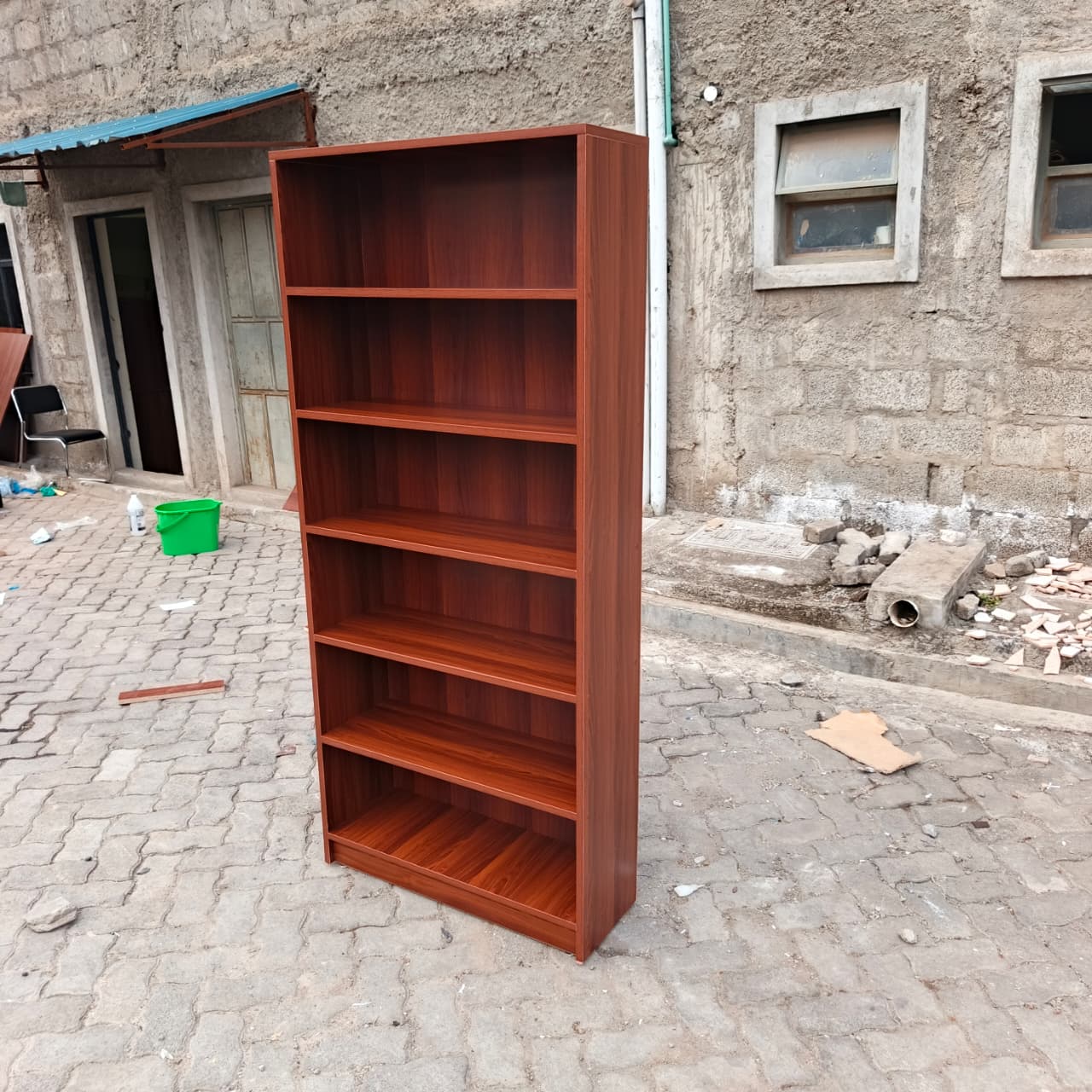 red brown bookshelf, six tier bookshelf, 6 tier bookcase, modern bookshelf, modern bookcase, wooden bookshelf, wooden bookcase, red brown bookcase, dark wood bookshelf, six shelf bookcase, tall bookshelf, tall bookcase, storage bookshelf, storage bookcase, display bookshelf, display bookcase, open shelf bookcase, open bookshelf, contemporary bookshelf, contemporary bookcase, minimalist bookshelf, minimalist bookcase, home bookshelf, office bookshelf, study bookshelf, library bookshelf, book storage shelf, home storage shelves, office storage shelves, decorative bookshelf, stylish bookcase, modern storage unit, multipurpose bookshelf, durable bookshelf, heavy duty bookcase, high quality bookshelf, premium bookcase, affordable bookshelf, compact bookshelf, space saving bookcase, vertical storage shelf, ladder style bookshelf, rectangular bookshelf, shelving unit modern, book organizer shelf, office book storage, study room bookshelf, bedroom bookshelf, living room bookshelf, bookshelf furniture Kenya, bookcase Nairobi, bookshelf Nairobi, wooden shelves Kenya, office bookshelf Kenya, home bookshelf Nairobi, study shelf Kenya, bookcase suppliers Nairobi, bookshelf for sale Kenya, bookcase deals Nairobi, cheap bookshelf Kenya, affordable bookcase Nairobi, premium bookshelf Kenya, modern bookshelf Kenya, bookcase showroom Nairobi, buy bookshelf Kenya, bookshelf online Nairobi, storage shelves Kenya, workspace shelves Nairobi, home furniture bookshelf Kenya, office furniture bookshelf Nairobi, library shelves Kenya, bookcase delivery Nairobi, shelving unit Kenya, modern shelving Nairobi, book rack Kenya, wooden book rack Nairobi, tall shelf Kenya, storage rack Nairobi, bookcase near me Kenya, Nairobi furniture shop bookshelf, Kenya furniture store bookcase, bookshelf best Kenya, bookcase high quality Nairobi, modern shelving unit Kenya, decorative shelf Nairobi, stylish bookshelf Kenya, elegant bookcase Nairobi, durable shelving Kenya, strong bookshelf Nairobi, vertical storage Nairobi Kenya, compact shelving Kenya, modern home decor shelf Nairobi, office decor bookshelf Kenya.