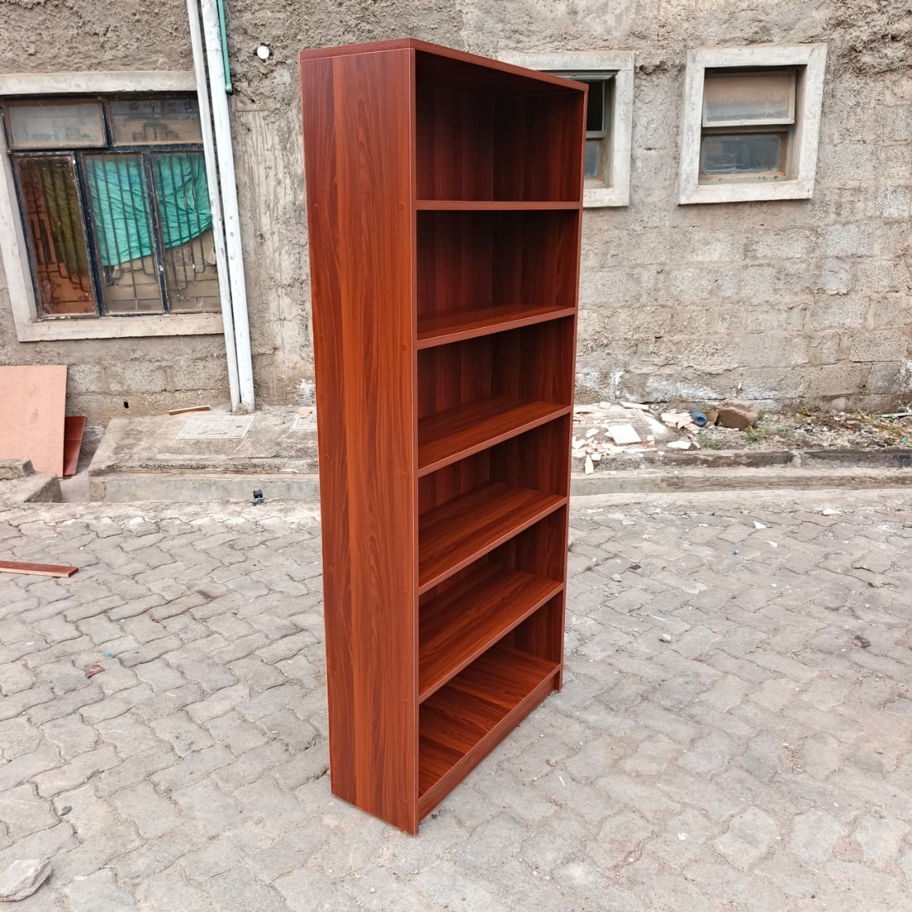 red brown bookshelf, six tier bookshelf, 6 tier bookcase, modern bookshelf, modern bookcase, wooden bookshelf, wooden bookcase, red brown bookcase, dark wood bookshelf, six shelf bookcase, tall bookshelf, tall bookcase, storage bookshelf, storage bookcase, display bookshelf, display bookcase, open shelf bookcase, open bookshelf, contemporary bookshelf, contemporary bookcase, minimalist bookshelf, minimalist bookcase, home bookshelf, office bookshelf, study bookshelf, library bookshelf, book storage shelf, home storage shelves, office storage shelves, decorative bookshelf, stylish bookcase, modern storage unit, multipurpose bookshelf, durable bookshelf, heavy duty bookcase, high quality bookshelf, premium bookcase, affordable bookshelf, compact bookshelf, space saving bookcase, vertical storage shelf, ladder style bookshelf, rectangular bookshelf, shelving unit modern, book organizer shelf, office book storage, study room bookshelf, bedroom bookshelf, living room bookshelf, bookshelf furniture Kenya, bookcase Nairobi, bookshelf Nairobi, wooden shelves Kenya, office bookshelf Kenya, home bookshelf Nairobi, study shelf Kenya, bookcase suppliers Nairobi, bookshelf for sale Kenya, bookcase deals Nairobi, cheap bookshelf Kenya, affordable bookcase Nairobi, premium bookshelf Kenya, modern bookshelf Kenya, bookcase showroom Nairobi, buy bookshelf Kenya, bookshelf online Nairobi, storage shelves Kenya, workspace shelves Nairobi, home furniture bookshelf Kenya, office furniture bookshelf Nairobi, library shelves Kenya, bookcase delivery Nairobi, shelving unit Kenya, modern shelving Nairobi, book rack Kenya, wooden book rack Nairobi, tall shelf Kenya, storage rack Nairobi, bookcase near me Kenya, Nairobi furniture shop bookshelf, Kenya furniture store bookcase, bookshelf best Kenya, bookcase high quality Nairobi, modern shelving unit Kenya, decorative shelf Nairobi, stylish bookshelf Kenya, elegant bookcase Nairobi, durable shelving Kenya, strong bookshelf Nairobi, vertical storage Nairobi Kenya, compact shelving Kenya, modern home decor shelf Nairobi, office decor bookshelf Kenya.