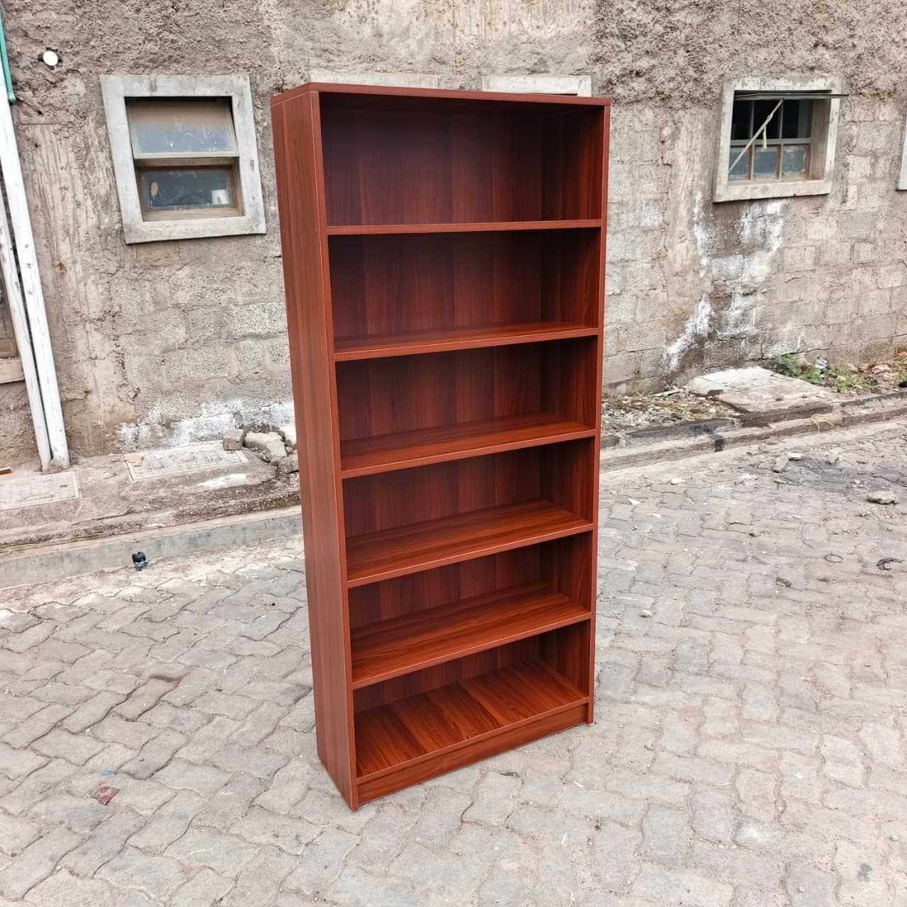 red brown bookshelf, six tier bookshelf, 6 tier bookcase, modern bookshelf, modern bookcase, wooden bookshelf, wooden bookcase, red brown bookcase, dark wood bookshelf, six shelf bookcase, tall bookshelf, tall bookcase, storage bookshelf, storage bookcase, display bookshelf, display bookcase, open shelf bookcase, open bookshelf, contemporary bookshelf, contemporary bookcase, minimalist bookshelf, minimalist bookcase, home bookshelf, office bookshelf, study bookshelf, library bookshelf, book storage shelf, home storage shelves, office storage shelves, decorative bookshelf, stylish bookcase, modern storage unit, multipurpose bookshelf, durable bookshelf, heavy duty bookcase, high quality bookshelf, premium bookcase, affordable bookshelf, compact bookshelf, space saving bookcase, vertical storage shelf, ladder style bookshelf, rectangular bookshelf, shelving unit modern, book organizer shelf, office book storage, study room bookshelf, bedroom bookshelf, living room bookshelf, bookshelf furniture Kenya, bookcase Nairobi, bookshelf Nairobi, wooden shelves Kenya, office bookshelf Kenya, home bookshelf Nairobi, study shelf Kenya, bookcase suppliers Nairobi, bookshelf for sale Kenya, bookcase deals Nairobi, cheap bookshelf Kenya, affordable bookcase Nairobi, premium bookshelf Kenya, modern bookshelf Kenya, bookcase showroom Nairobi, buy bookshelf Kenya, bookshelf online Nairobi, storage shelves Kenya, workspace shelves Nairobi, home furniture bookshelf Kenya, office furniture bookshelf Nairobi, library shelves Kenya, bookcase delivery Nairobi, shelving unit Kenya, modern shelving Nairobi, book rack Kenya, wooden book rack Nairobi, tall shelf Kenya, storage rack Nairobi, bookcase near me Kenya, Nairobi furniture shop bookshelf, Kenya furniture store bookcase, bookshelf best Kenya, bookcase high quality Nairobi, modern shelving unit Kenya, decorative shelf Nairobi, stylish bookshelf Kenya, elegant bookcase Nairobi, durable shelving Kenya, strong bookshelf Nairobi, vertical storage Nairobi Kenya, compact shelving Kenya, modern home decor shelf Nairobi, office decor bookshelf Kenya.