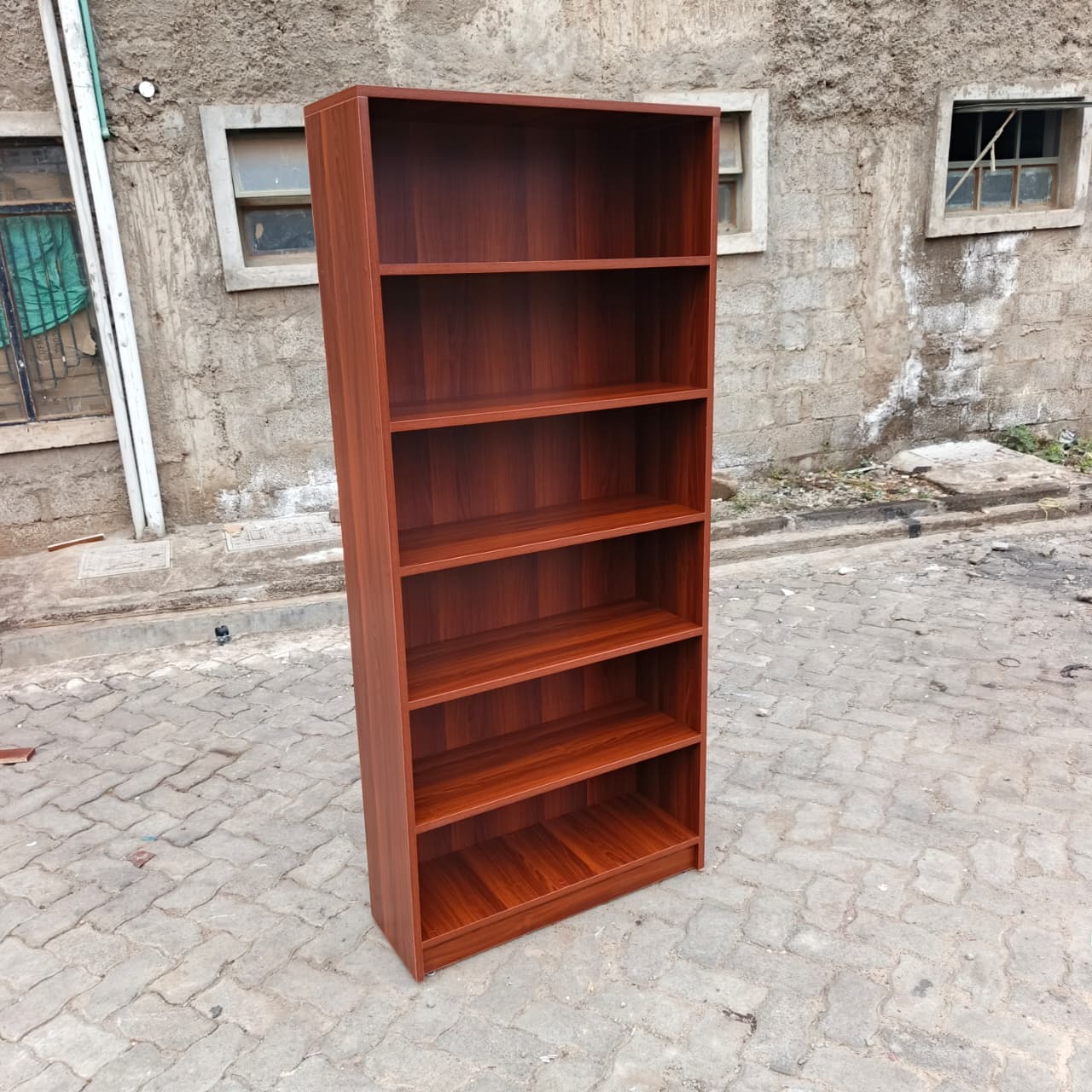 red brown bookshelf, six tier bookshelf, 6 tier bookcase, modern bookshelf, modern bookcase, wooden bookshelf, wooden bookcase, red brown bookcase, dark wood bookshelf, six shelf bookcase, tall bookshelf, tall bookcase, storage bookshelf, storage bookcase, display bookshelf, display bookcase, open shelf bookcase, open bookshelf, contemporary bookshelf, contemporary bookcase, minimalist bookshelf, minimalist bookcase, home bookshelf, office bookshelf, study bookshelf, library bookshelf, book storage shelf, home storage shelves, office storage shelves, decorative bookshelf, stylish bookcase, modern storage unit, multipurpose bookshelf, durable bookshelf, heavy duty bookcase, high quality bookshelf, premium bookcase, affordable bookshelf, compact bookshelf, space saving bookcase, vertical storage shelf, ladder style bookshelf, rectangular bookshelf, shelving unit modern, book organizer shelf, office book storage, study room bookshelf, bedroom bookshelf, living room bookshelf, bookshelf furniture Kenya, bookcase Nairobi, bookshelf Nairobi, wooden shelves Kenya, office bookshelf Kenya, home bookshelf Nairobi, study shelf Kenya, bookcase suppliers Nairobi, bookshelf for sale Kenya, bookcase deals Nairobi, cheap bookshelf Kenya, affordable bookcase Nairobi, premium bookshelf Kenya, modern bookshelf Kenya, bookcase showroom Nairobi, buy bookshelf Kenya, bookshelf online Nairobi, storage shelves Kenya, workspace shelves Nairobi, home furniture bookshelf Kenya, office furniture bookshelf Nairobi, library shelves Kenya, bookcase delivery Nairobi, shelving unit Kenya, modern shelving Nairobi, book rack Kenya, wooden book rack Nairobi, tall shelf Kenya, storage rack Nairobi, bookcase near me Kenya, Nairobi furniture shop bookshelf, Kenya furniture store bookcase, bookshelf best Kenya, bookcase high quality Nairobi, modern shelving unit Kenya, decorative shelf Nairobi, stylish bookshelf Kenya, elegant bookcase Nairobi, durable shelving Kenya, strong bookshelf Nairobi, vertical storage Nairobi Kenya, compact shelving Kenya, modern home decor shelf Nairobi, office decor bookshelf Kenya.